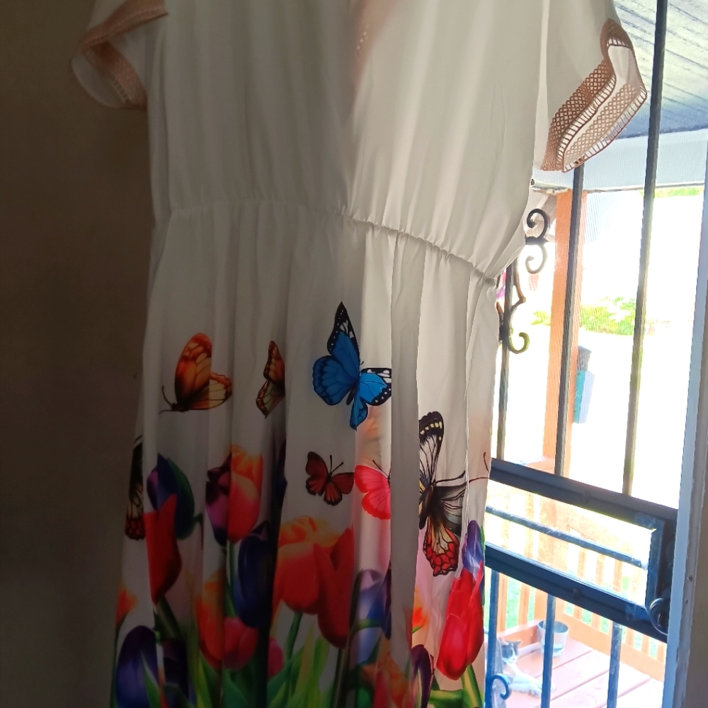 White dress with butterflies and flowers
